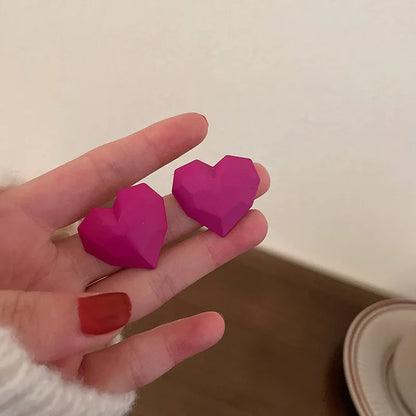 Herzförmige Ohrstecker - sunny.side-Productions