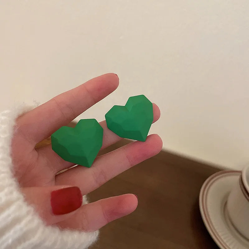 Herzförmige Ohrstecker - sunny.side-Productions