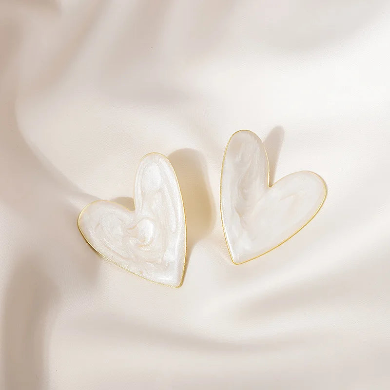 Herzförmige Ohrstecker - sunny.side-Productions