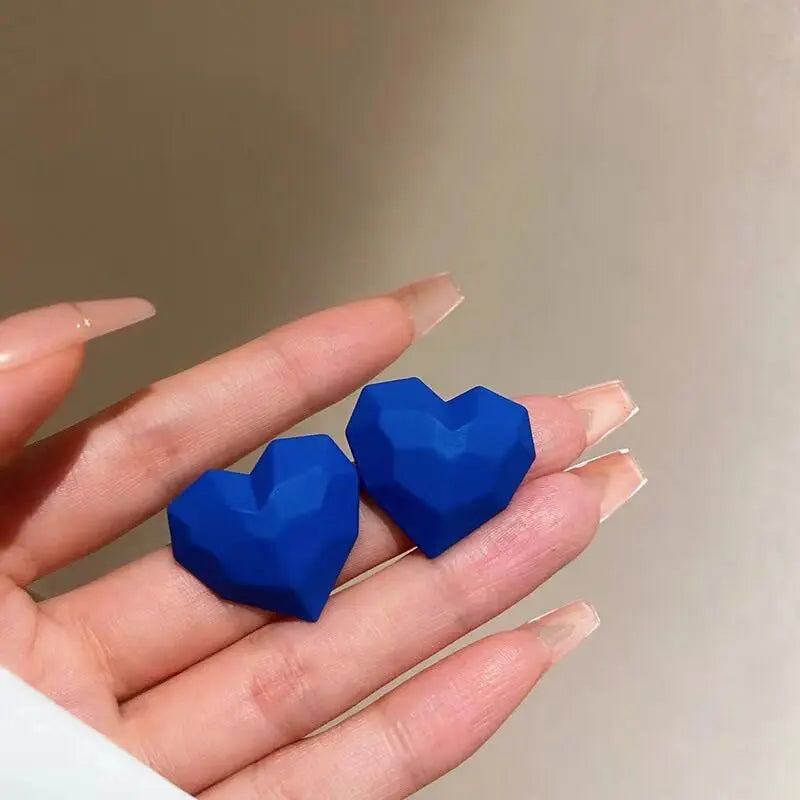 Herzförmige Ohrstecker - sunny.side-Productions